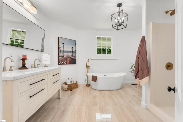 bathroom with vanity, separate shower and tub, wood-type flooring, and a chandelier