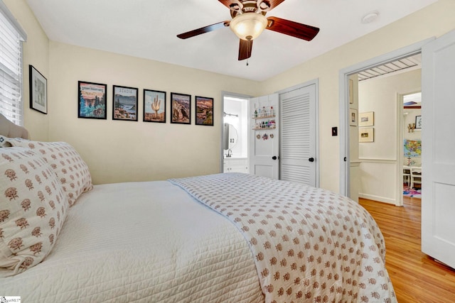 bedroom featuring ceiling fan and light wood-type flooring