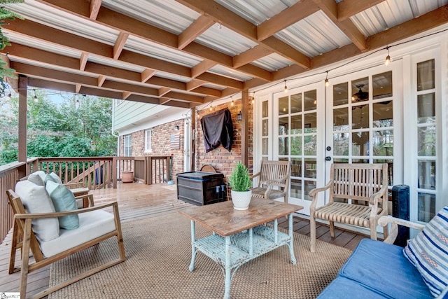 view of patio / terrace with french doors and a wooden deck