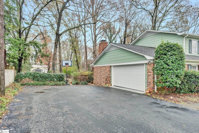 view of home's exterior with a garage