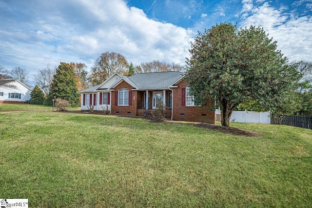 ranch-style house with a front lawn