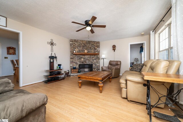 249 Monroe Bridge Rd, Honea Path, SC 29654 - living room featuring ceiling fan, light hardwood / wood-style floors, and a textured ceiling