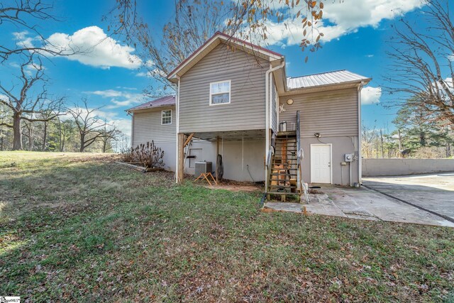 249 Monroe Bridge Rd, Honea Path, SC 29654 - rear view of property featuring a yard and central air condition unit