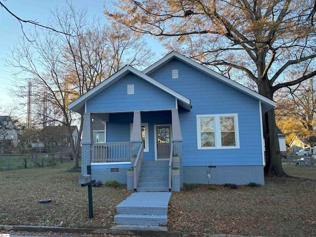 bungalow-style home featuring covered porch