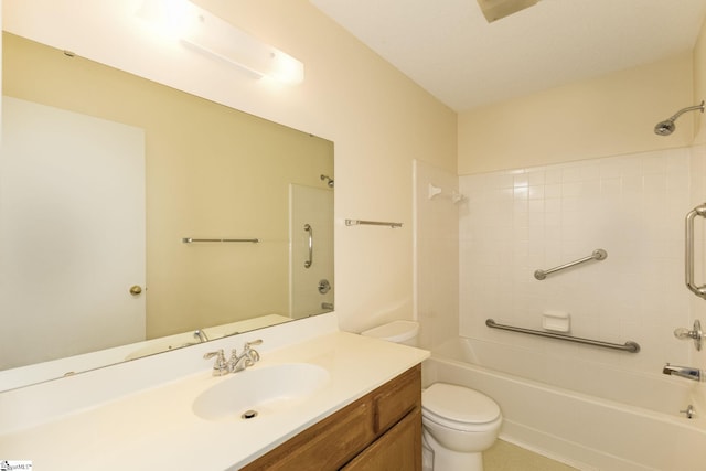 full bathroom with tiled shower / bath combo, toilet, and vanity