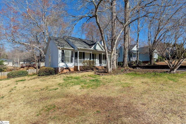 view of front of home featuring a porch and a front yard