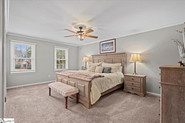 bedroom featuring ceiling fan, light colored carpet, and ornamental molding