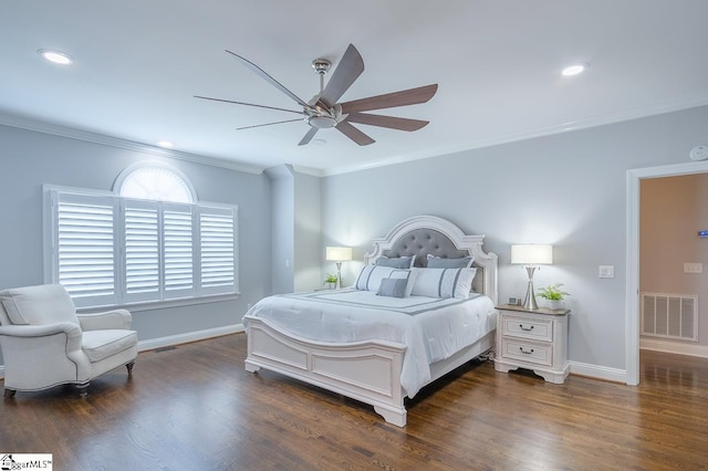 bedroom with ceiling fan, crown molding, and dark wood-type flooring