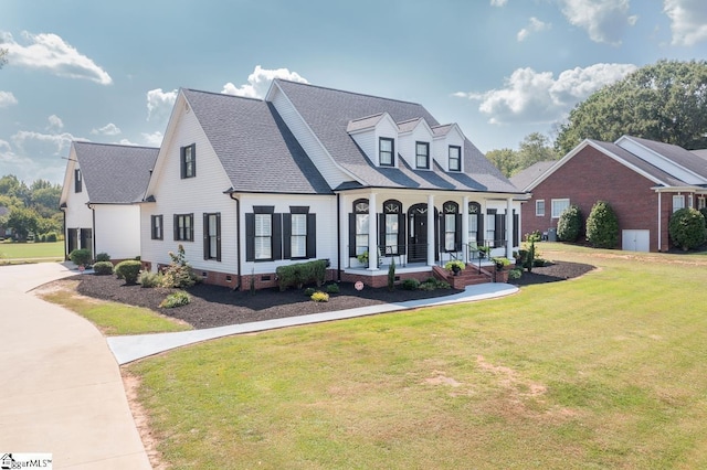 cape cod-style house with a porch and a front yard