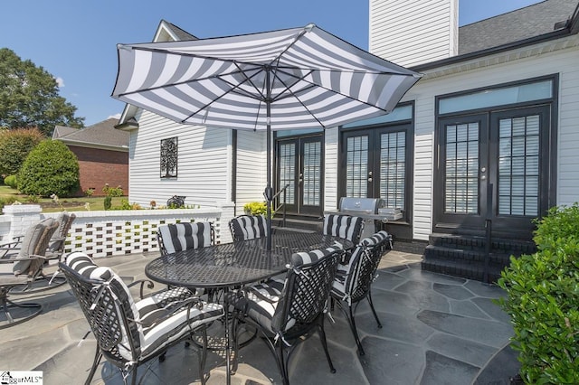 view of patio featuring french doors