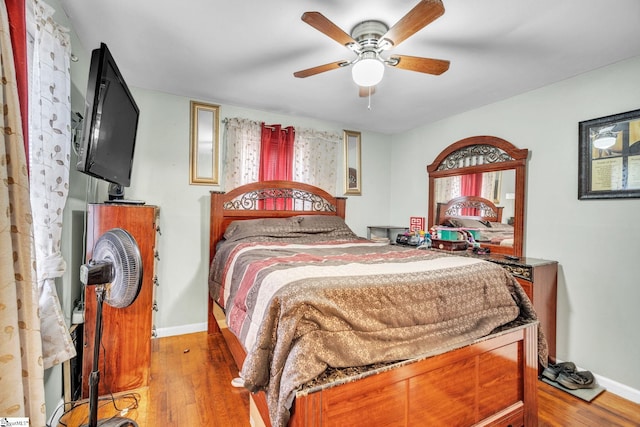 bedroom featuring ceiling fan and light wood-type flooring