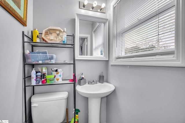 bathroom featuring sink and toilet