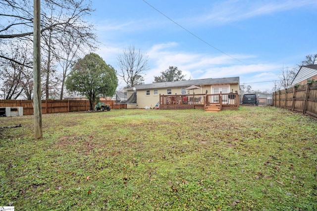 view of yard featuring a deck