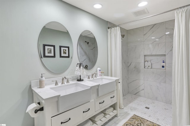 bathroom with vanity and a shower with shower curtain