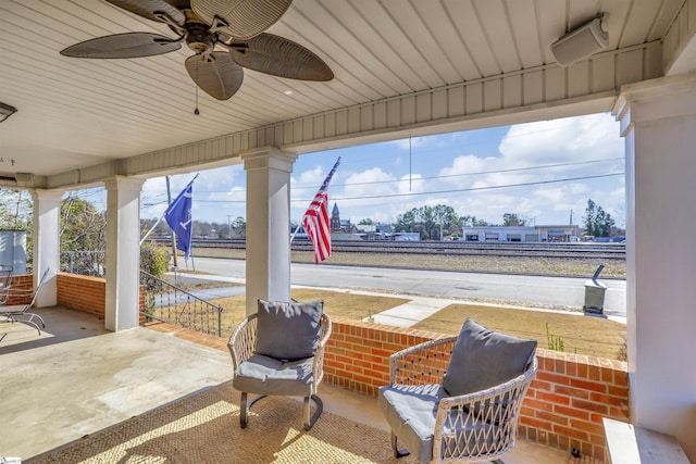 view of patio / terrace featuring ceiling fan