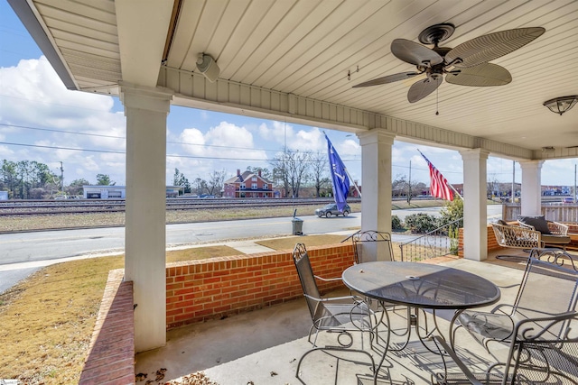 view of patio featuring ceiling fan