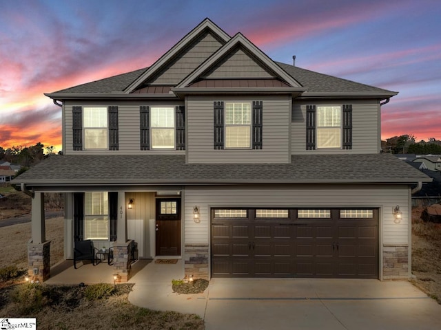 craftsman-style home featuring a garage