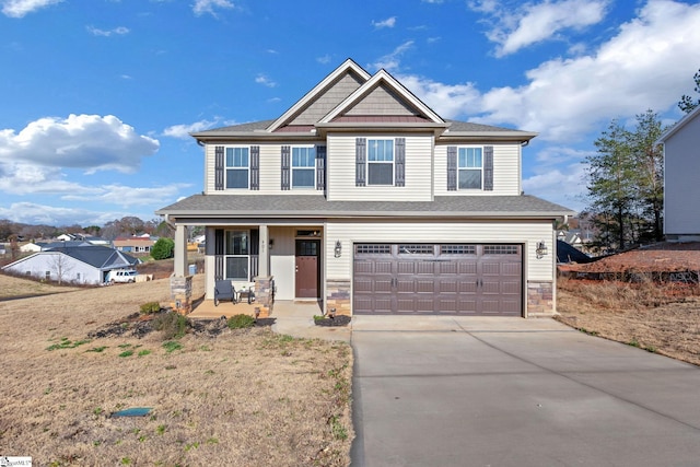 craftsman inspired home with a porch and a garage