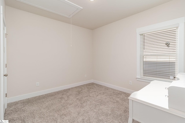 unfurnished office featuring light carpet