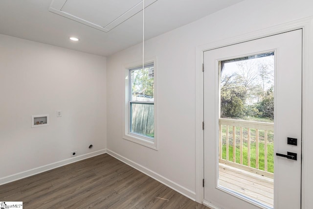 doorway to outside with plenty of natural light and dark hardwood / wood-style floors