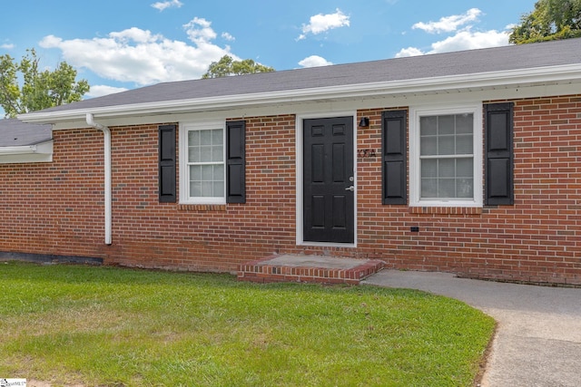 view of front of home with a front yard