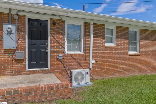 doorway to property with ac unit