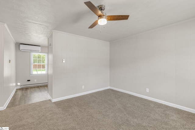 carpeted spare room with a wall mounted air conditioner, a baseboard heating unit, ceiling fan, ornamental molding, and a textured ceiling