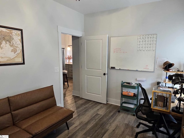 office space with dark hardwood / wood-style flooring