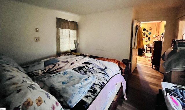 bedroom featuring hardwood / wood-style flooring