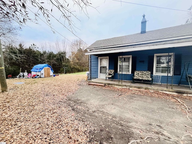 exterior space featuring a porch