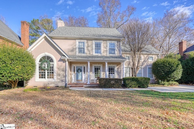 colonial house with a front lawn