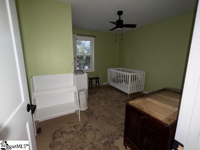 bedroom featuring ceiling fan