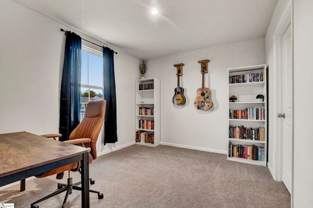 office area with light colored carpet