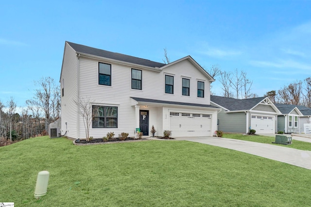 view of front of home featuring a garage and a front yard