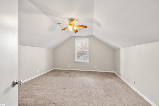 bonus room with ceiling fan, carpet, and vaulted ceiling