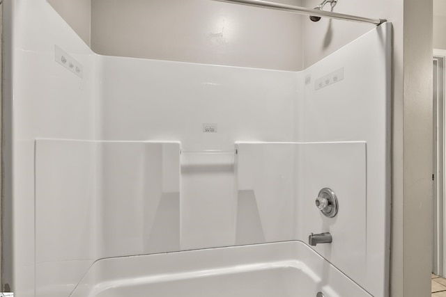 bathroom featuring tub / shower combination