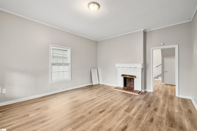 unfurnished living room with light hardwood / wood-style flooring and ornamental molding