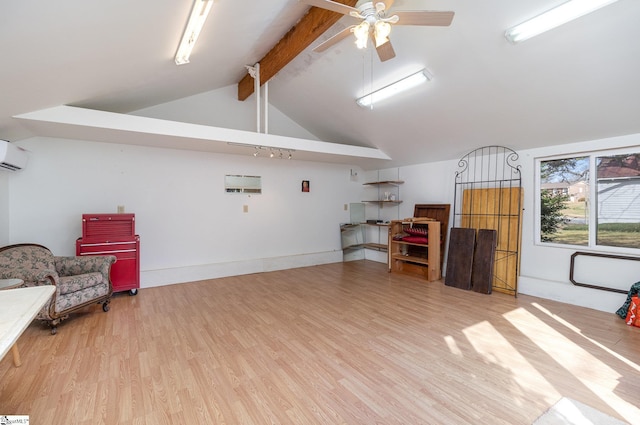 living area with a wall mounted air conditioner, vaulted ceiling with beams, light hardwood / wood-style flooring, and ceiling fan