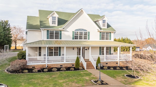 view of front facade featuring a front lawn and a porch