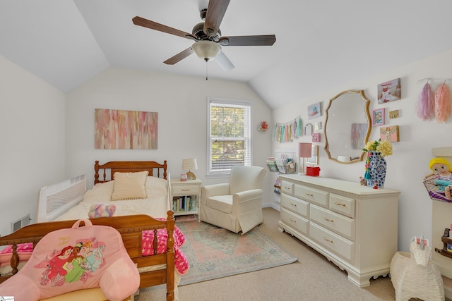 bedroom with ceiling fan, light carpet, and vaulted ceiling