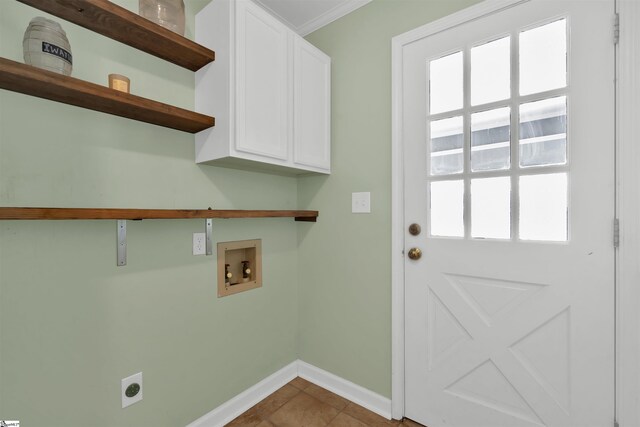 laundry room featuring hookup for a washing machine, light tile patterned floors, cabinets, and hookup for an electric dryer