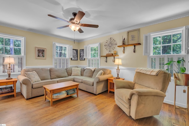 living room with plenty of natural light and light hardwood / wood-style floors