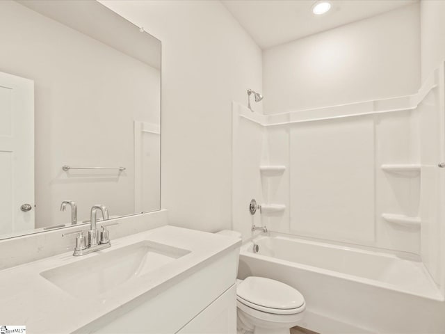 full bathroom featuring shower / bath combination, toilet, and vanity