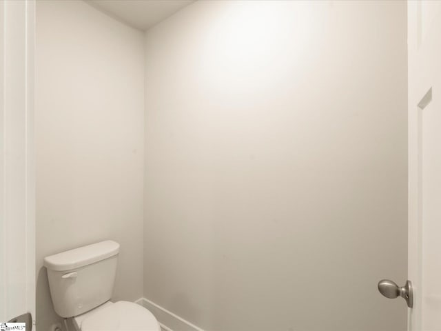 bathroom featuring toilet