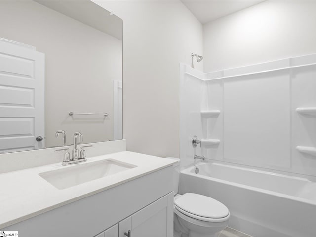 full bathroom featuring shower / tub combination, vanity, and toilet