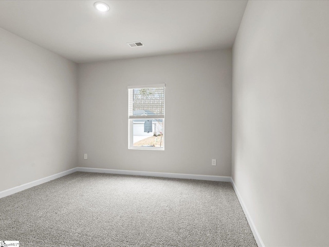 empty room featuring carpet floors