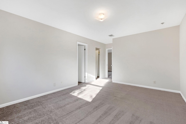 unfurnished room with carpet