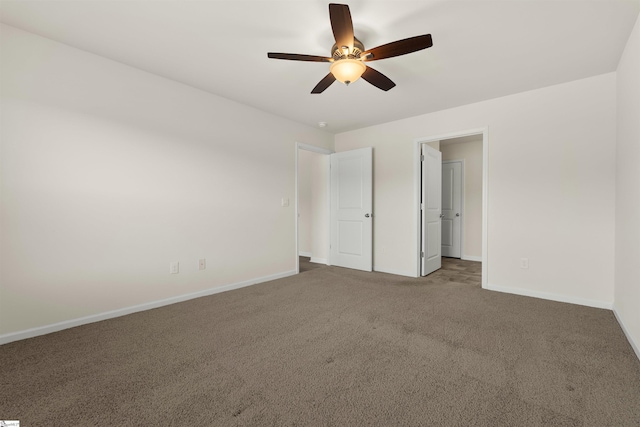 unfurnished bedroom with ceiling fan and carpet floors