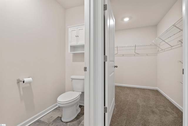 bathroom featuring toilet