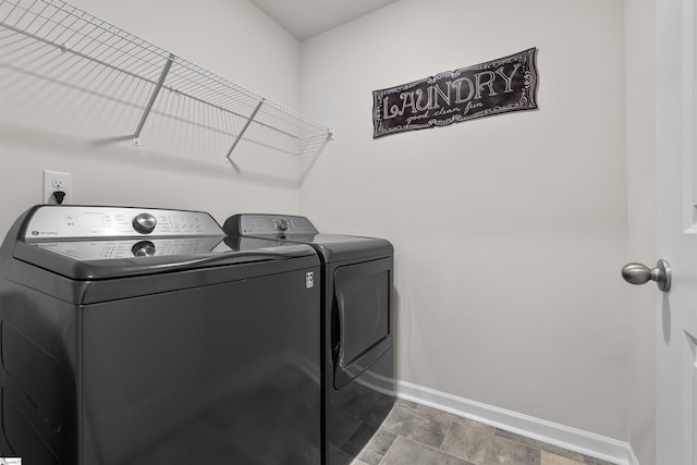 laundry room featuring washing machine and dryer